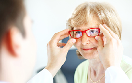 women trying on glasses